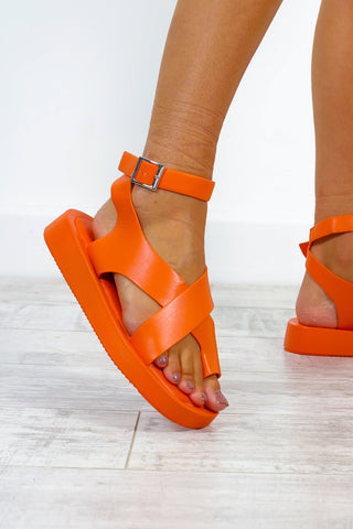 At A Crossroads - Orange Sandals
